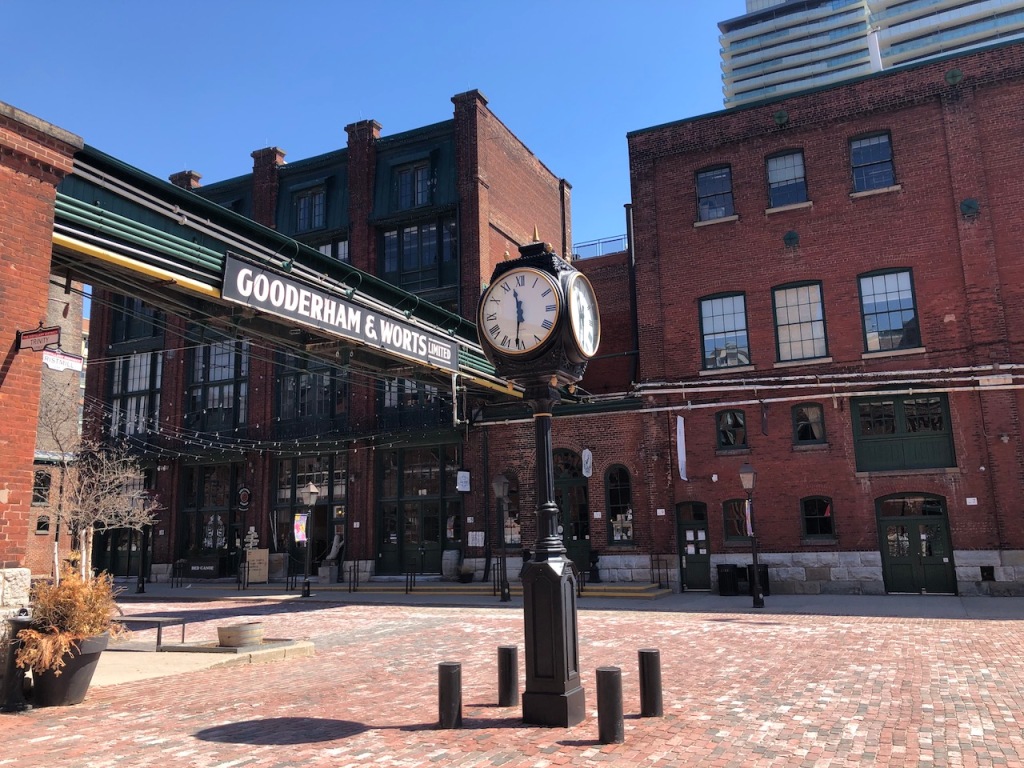 Clock and Gooderham & Worts Limited sign.